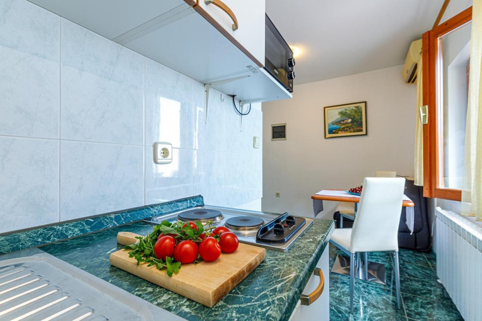 Apartments Jasminka Ловран Стая снимка